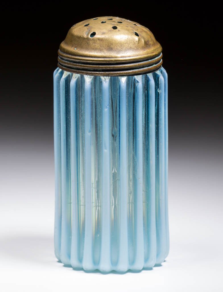 BEATTY RIB SUGAR SHAKER: BEATTY RIB SUGAR SHAKER, blue opalescent, period lid. A. J. Beatty & Sons. Circa 1889. 5" HOA. Literature: Parallels Heacock/Elmore - Opalescent Glass From A-Z, p. 120, fig. 129.