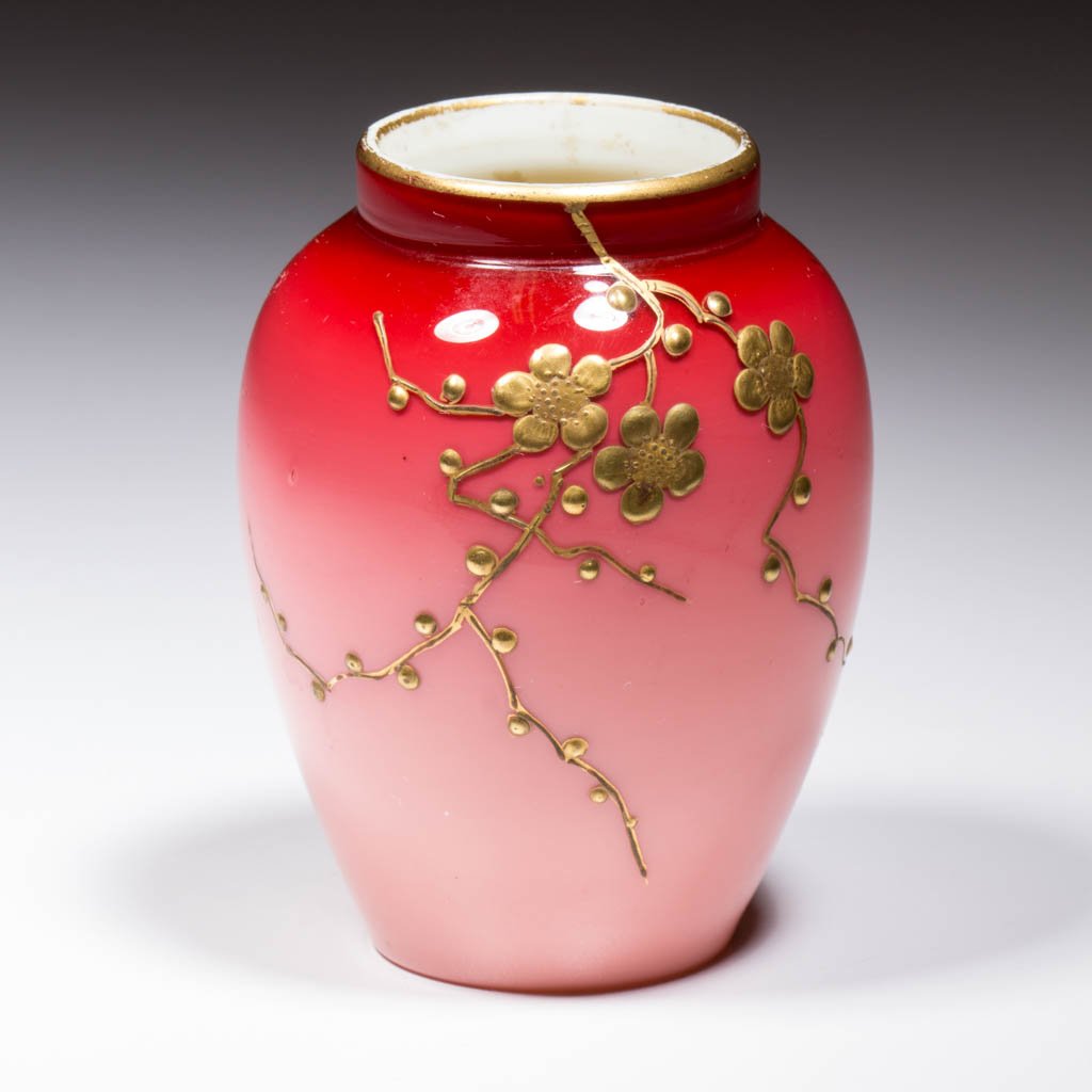WEBB PEACHBLOW CABINET VASE: WEBB PEACHBLOW CABINET VASE, with gold-enamel decoration, polished pontil mark. Thomas Webb & Sons. Fourth quarter 19th century. 3 1/4" H.