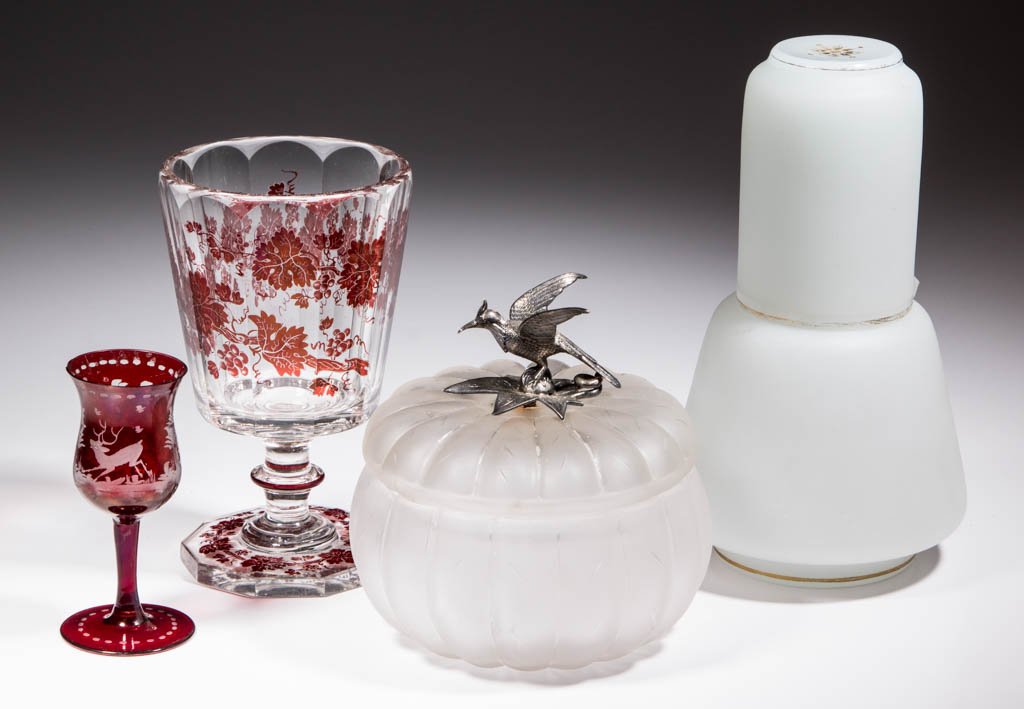 ASSORTED GLASS ARTICLES, LOT OF FOUR: ASSORTED GLASS ARTICLES, LOT OF FOUR, comprising an opaline tumble-up with stopper and gilt decoration, a melon-form covered bowl with quadruple-plate bird finial, a ruby-stained Bohemian engraved win