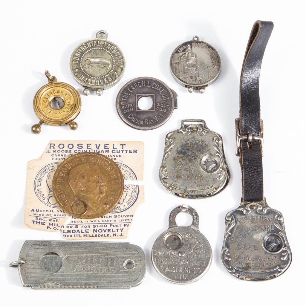 ASSORTED ADVERTISING CIGAR CUTTERS, LOT OF NINE (1 of 1)