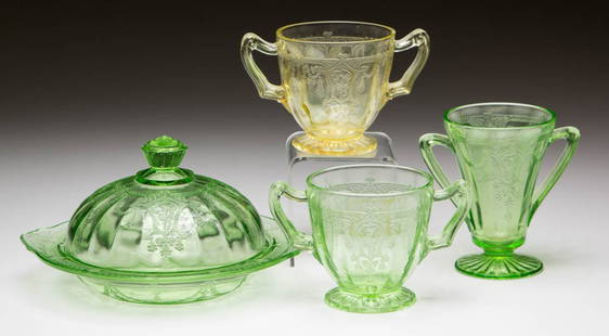 CAMEO DEPRESSION GLASS TABLE ARTICLES, LOT OF THREE: CAMEO DEPRESSION GLASS TABLE ARTICLES, LOT OF THREE, green, comprising a covered butter dish and two open sugars. Together with a Vaseline (black lighted) open sugar. Four pieces total. Hocking Glass