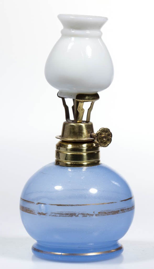 OPALINE GLASS MINIATURE LAMP: OPALINE GLASS MINIATURE LAMP, soft blue with gilt decorated bands, ball-form font, opaque white chimney-shade, period collar with patent information. Fitted with an Olmstead burner. Fourth quarter 19t