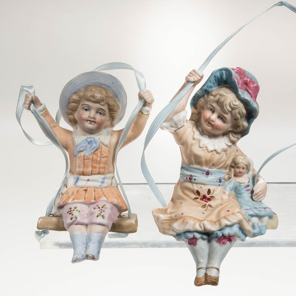 GERMAN BISQUE FIGURAL SWINGERS, LOT OF TWO (1 of 1)