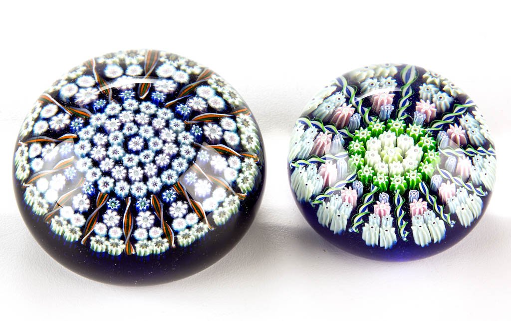 CONTEMPORARY PERTHSHIRE PANELLED MILLEFIORI: CONTEMPORARY PERTHSHIRE PANELLED MILLEFIORI PAPERWEIGHTS,, various colors, each retain original manufacturing sticker, smaller example with a signature "P" cane. 20th century. 2 3/8" and 3" D. Undamag