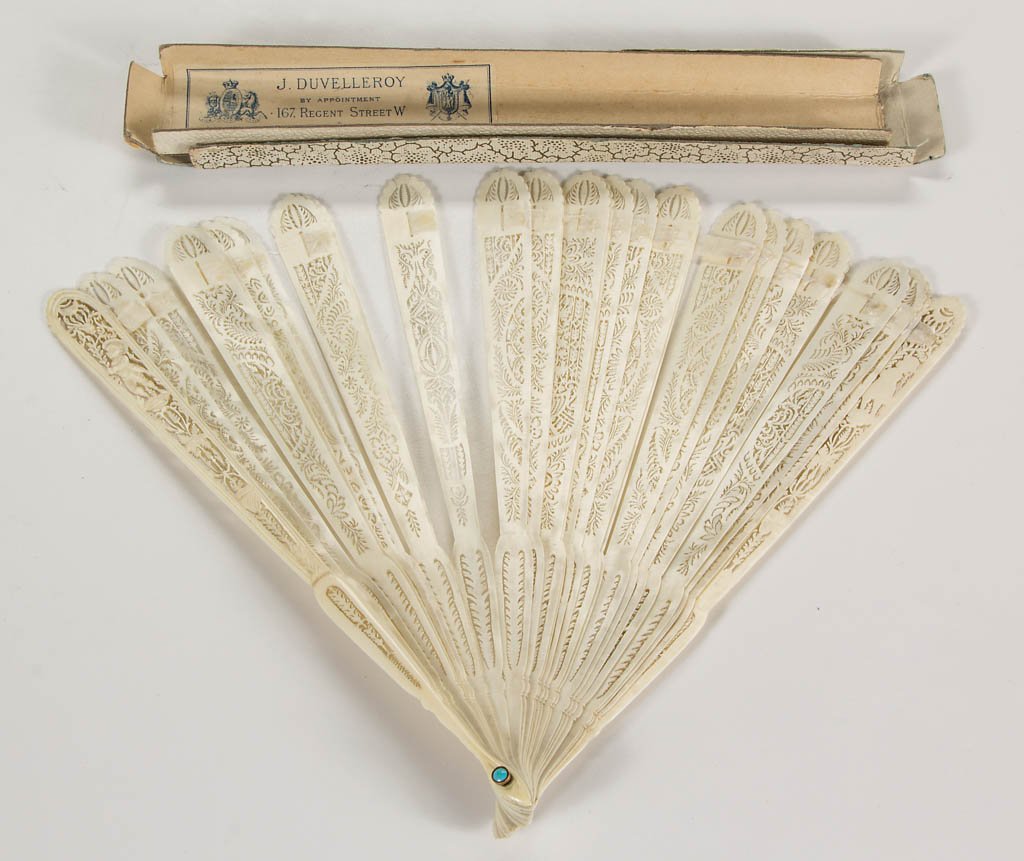 CONTINENTAL, PROBABLY FRENCH, CARVED BONE / DIEPPE: CONTINENTAL, PROBABLY FRENCH, CARVED BONE / DIEPPE LADY'S HAND FAN, fine pierce-carved designs, retains old box with label for "J. Duvelleroy / 167 Regent Street W / Londres / Paris" advertising "Fans