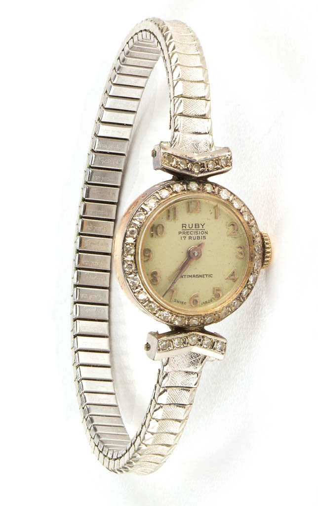 VINTAGE SWISS LADY'S GOLD AND DIAMOND WRIST WATCH: VINTAGE SWISS LADY'S GOLD AND DIAMOND WRIST WATCH, back of case marked "19K" above unidentified hallmarks, front set with 36 melee diamonds, face marked "Ruby / Precision / 17 Rubis", "Antimagnetic", 