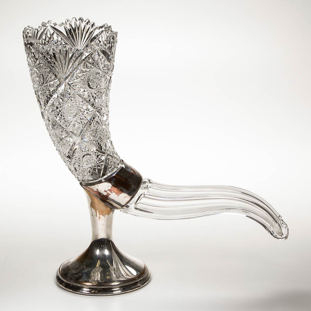 AMERICAN BRILLIANT CUT GLASS CORNUCOPIA VASE: AMERICAN BRILLIANT CUT GLASS CORNUCOPIA VASE, large hobstars in square miters between fans at rim and triangles of cane at base, hexagonal extension with finely notched corners and terminating in a fa