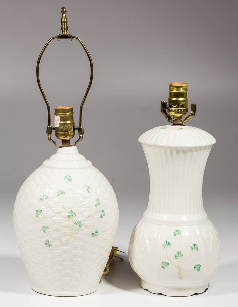 IRISH BELLEEK PORCELAIN LAMPS, LOT OF TWO: IRISH BELLEEK PORCELAIN LAMPS, LOT OF TWO, both felted on bottom and electrified, one is an ovoid shape with basketweave design, the other with knotwork at base and a fluted, flaring neck. Both are ma