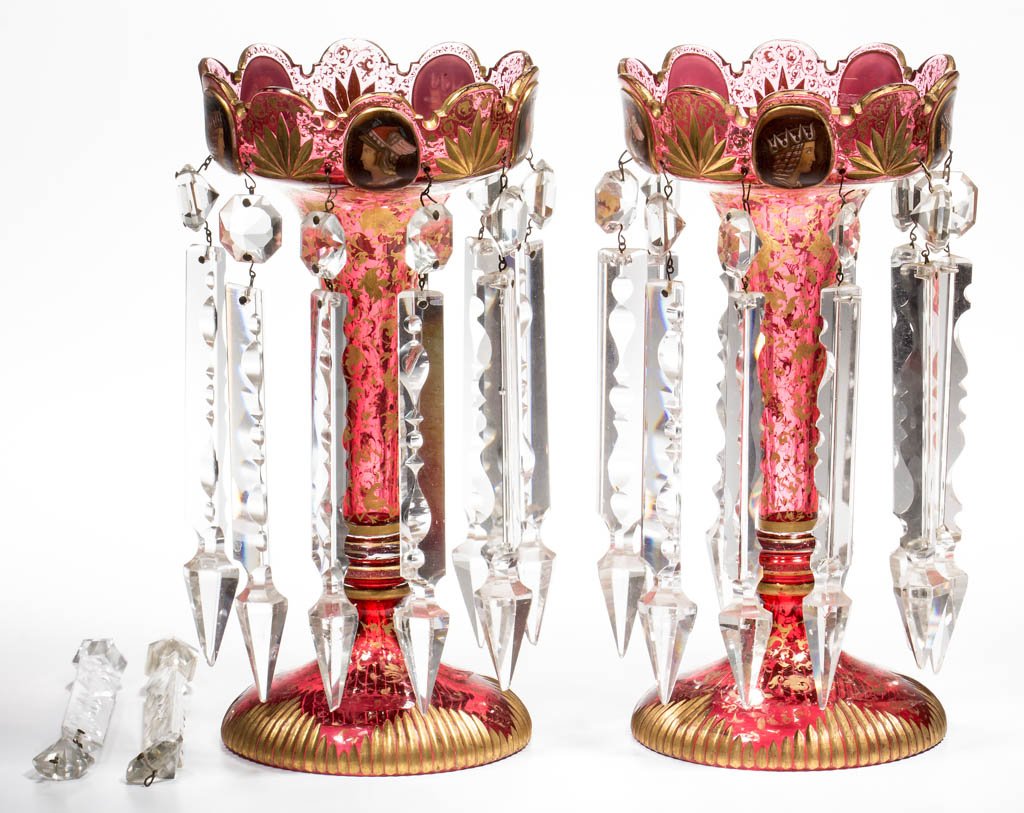 MOSER-STYLE CUT AND GILDED PAIR OF MANTLE LUSTERS: MOSER-STYLE CUT AND GILDED PAIR OF MANTLE LUSTERS, cranberry cased colorless, each trumpet-form vase with galleried top featuring cut fans and five applied opal medallions hand-painted with classical
