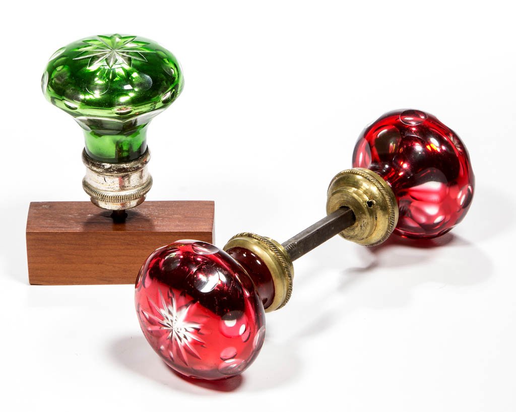 CUT OVERLAY AND SILVERED KNOBS, LOT OF THREE: CUT OVERLAY AND SILVERED KNOBS, LOT OF THREE, green to colorless and ruby to colorless with silvered interior, comprising a picture knob with original silver-plated metal mount with screw shank, and p