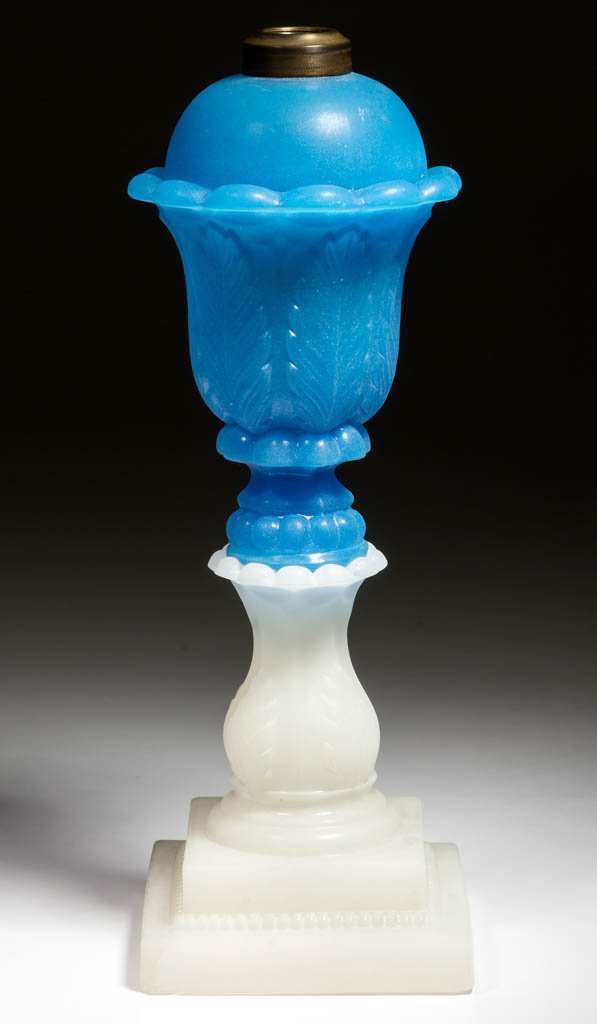 PRESSED ACANTHUS LEAF WHALE OIL / FLUID STAND LAMP: PRESSED ACANTHUS LEAF WHALE OIL / FLUID STAND LAMP, translucent starch blue font, alabaster/clambroth base, overall lightly sanded surface, large size, dome-top font with 12 protruding petals below th