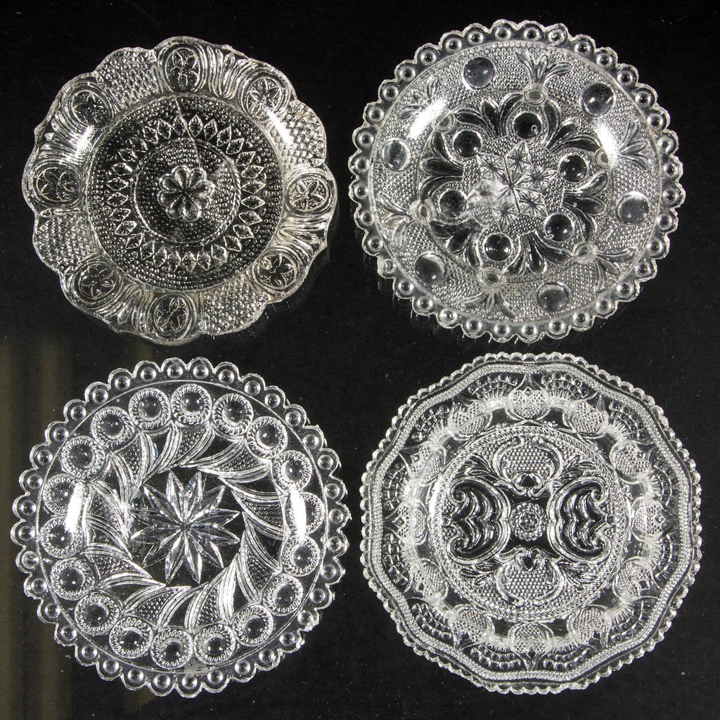 LEE/ROSE NO. 22, 29, 37, 101, 134-A, 135-A, 174, AND: LEE/ROSE NO. 22, 29, 37, 101, 134-A, 135-A, 174, AND 246 CUP PLATES, LOT OF EIGHT, colorless. Boston & Sandwich Glass Co. and others. 1828-1840. Various sizes. Provenance: Anne Serra, Cuba, NY. Near p