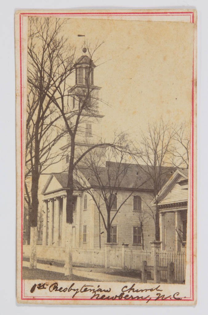 NEW BERN, NORTH CAROLINA HISTORICAL CDV PHOTOGRAPH: NEW BERN, NORTH CAROLINA HISTORICAL CDV PHOTOGRAPH, depicting the 1st Presbyterian Church, backstamped for J. D. Heywood photographer. Circa 1870. 4" x 2 1/2". Very good condition with some light toni