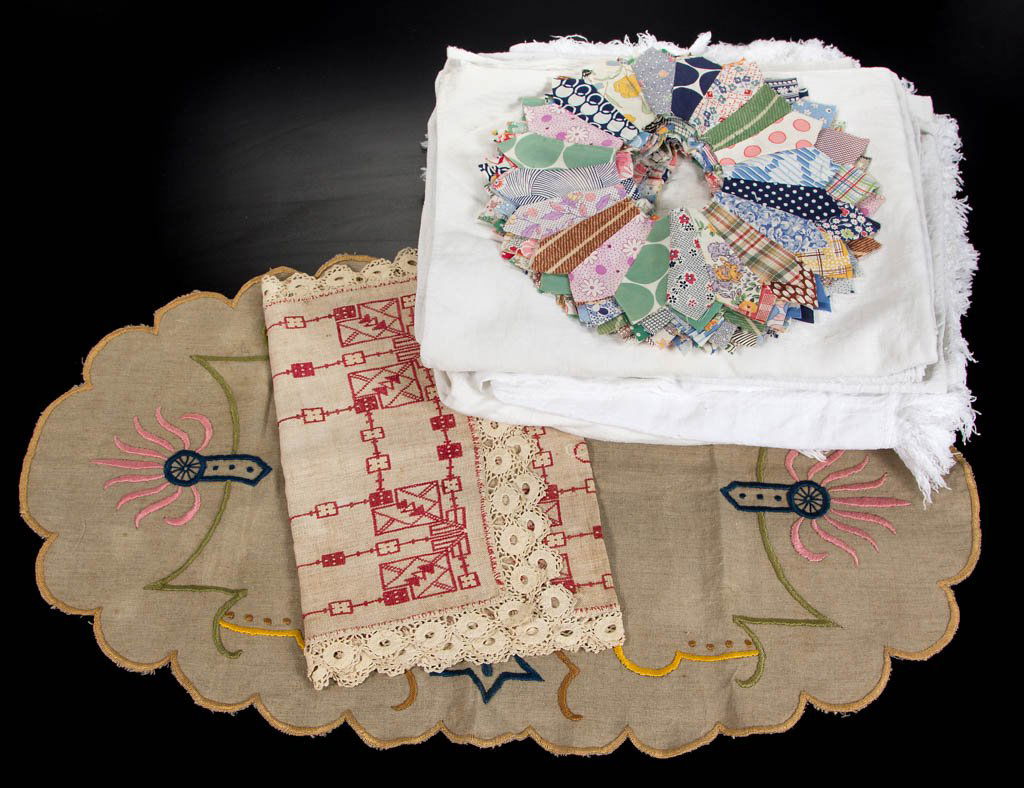 ASSORTED TEXTILE ARTICLES: ASSORTED TEXTILE ARTICLES, uncounted lot, comprising four white counterpanes, two Arts & Crafts embroidered table runners, and a stack of pieced "Dresden Plate" pattern quilt pieces. 19th/20th century
