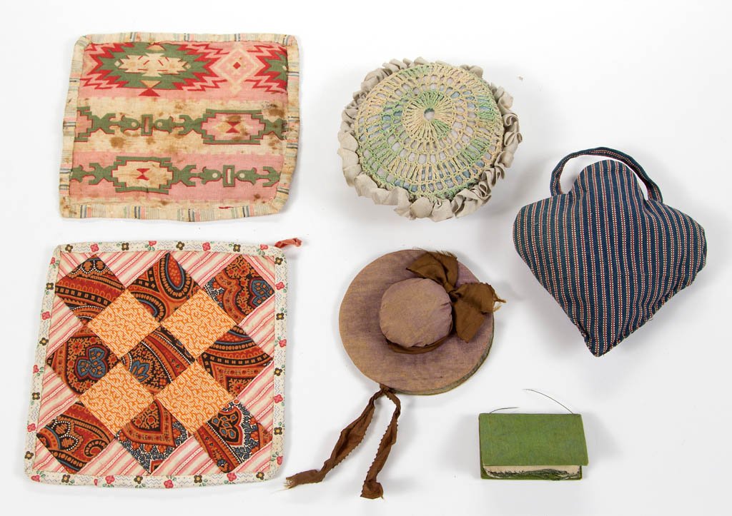 MISCELLANEOUS ASSORTMENT PIN CUSHION AND NEEDLE CASES,: MISCELLANEOUS ASSORTMENT PIN CUSHION AND NEEDLE CASES, LOT OF SIX, various sizes and shapes, one small silk-covered, book with flannel inserts for needles; silk hat-shaped needle case with pin cushion