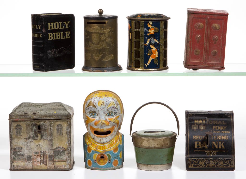 ASSORTED TIN PENNY BANKS, LOT OF EIGHT: ASSORTED TIN PENNY BANKS, LOT OF EIGHT, one clown form with tongue that sticks out when tab is pushed down, one safe form marked "JAPAN", and one "NATIONAL / PENNY / REGISTERING / BANK". 20th century.