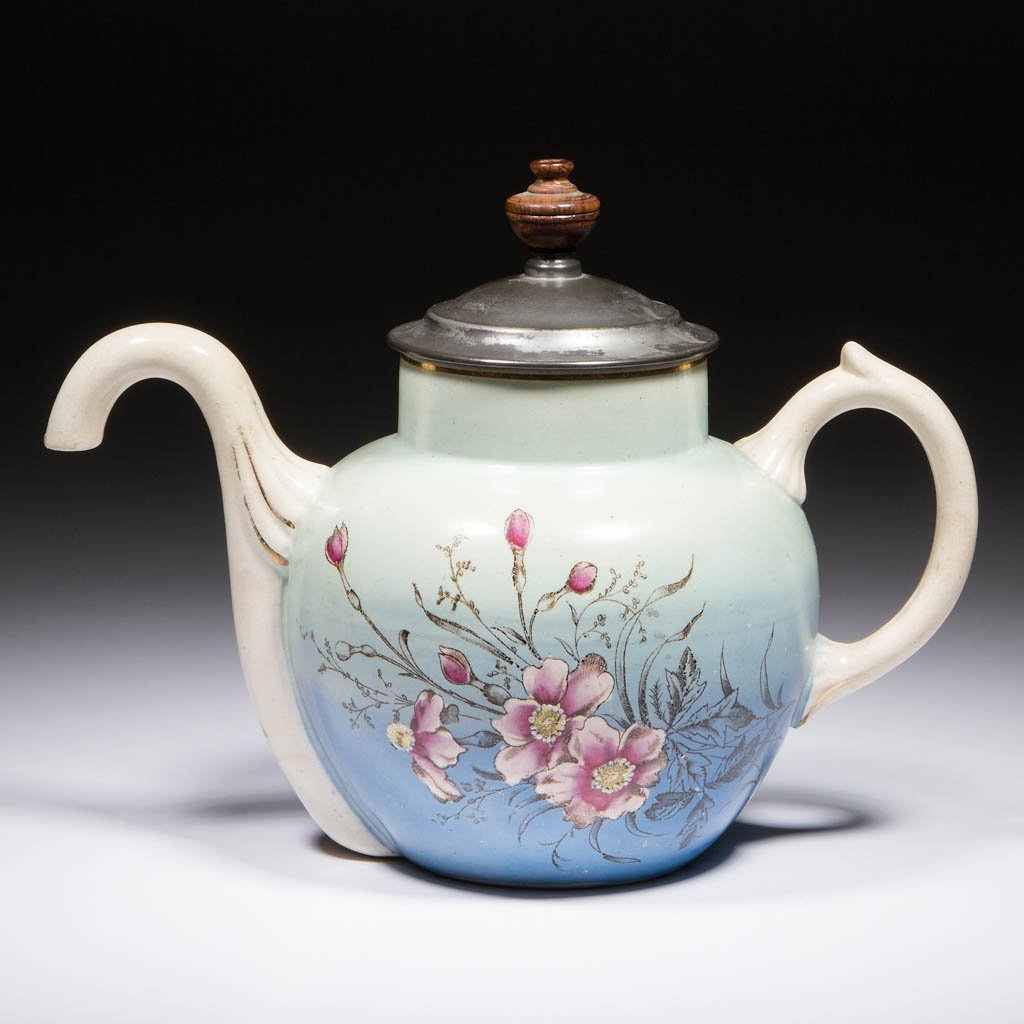 ENGLISH SELF-POURING CERAMIC TEAPOT (1 of 2)