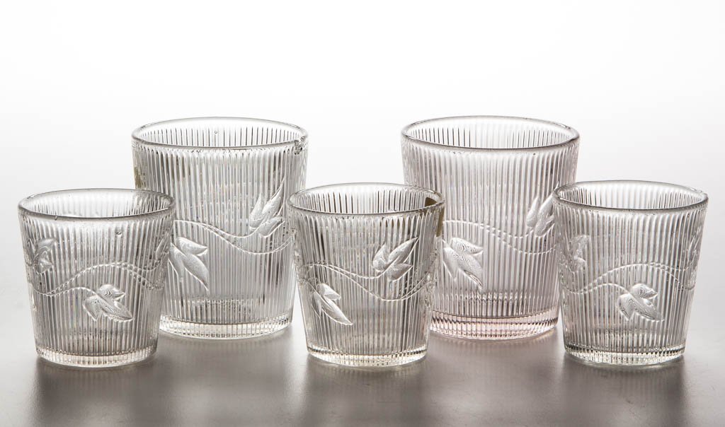 RIBBED IVY TUMBLERS, LOT OF FIVE: RIBBED IVY TUMBLERS, LOT OF FIVE, colorless lead glass, comprising three whiskey and two water. Medium resonance. Boston & Sandwich Glass Co. and others. Third quarter 19th century. 2 3/4" and 3 1/2" 