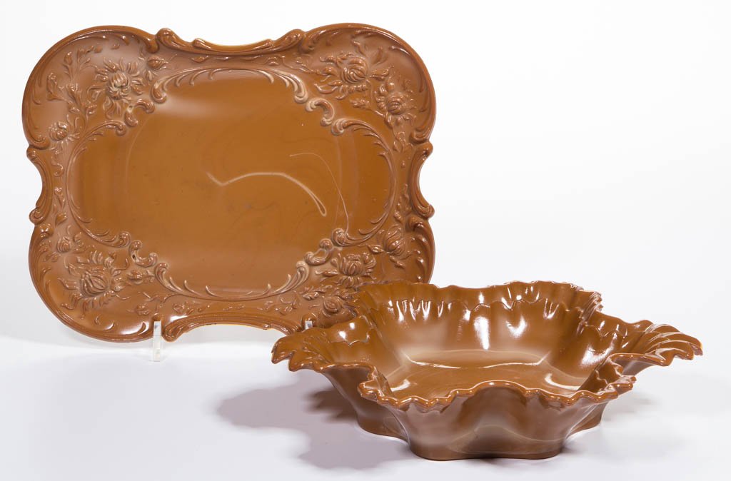 MCKEE TABLE ARTICLES, LOT OF TWO: MCKEE TABLE ARTICLES, LOT OF TWO, chocolate, comprising a Venetian tray, and a Six-Fluted bowl. McKee Glass Co. Late 19th/early 20th century. tray 10" x 8" OA, bowl 2 1/4" H, 10" L. Virtually undamage