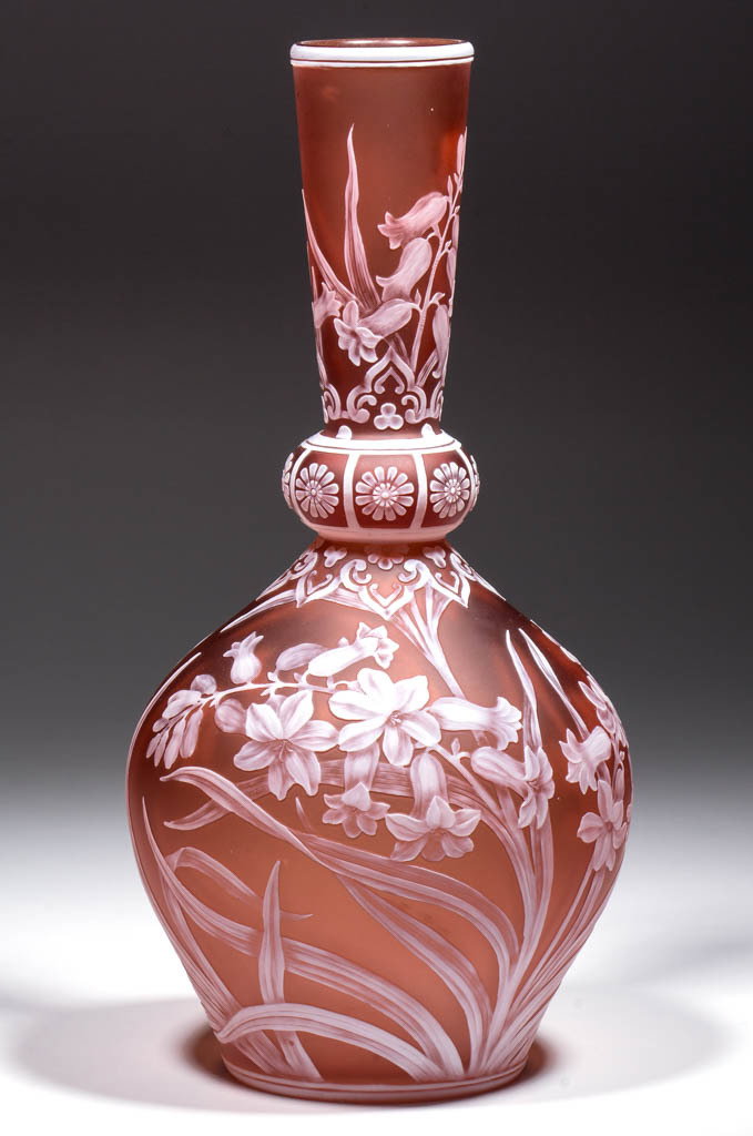 STEVENS AND WILLIAMS CAMEO GLASS VASE: STEVENS AND WILLIAMS CAMEO GLASS VASE, white to apricot, bulbous base with a single neck ring with floral band and a tapered conical mouth, Canterbury Bells motif, beetle in flight on one face and a b