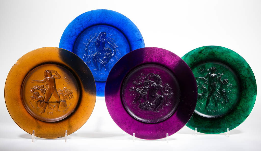 DAUM NANCY PATTE DE VERRE SEASONS PLATES, LOT OF FOUR: DAUM NANCY PATTE DE VERRE SEASONS PLATES, LOT OF FOUR, mottled blue green, amethyst, amber, and cobalt blue, comprising four examples, each representing one of four seasons. France. 20th century. 10 1