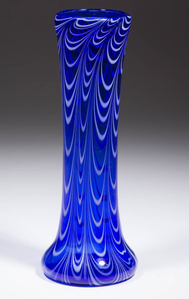 IMPERIAL DECORATED FREE HAND VASE: IMPERIAL DECORATED FREE HAND VASE, blue with seven groups of opal loopings, Lead Lustre 619-12. Imperial Glass Co. Circa 1925. 9 1/8" H, 2 1/2" D rim, 3 1/4" D base. Undamaged with a few scratches nea