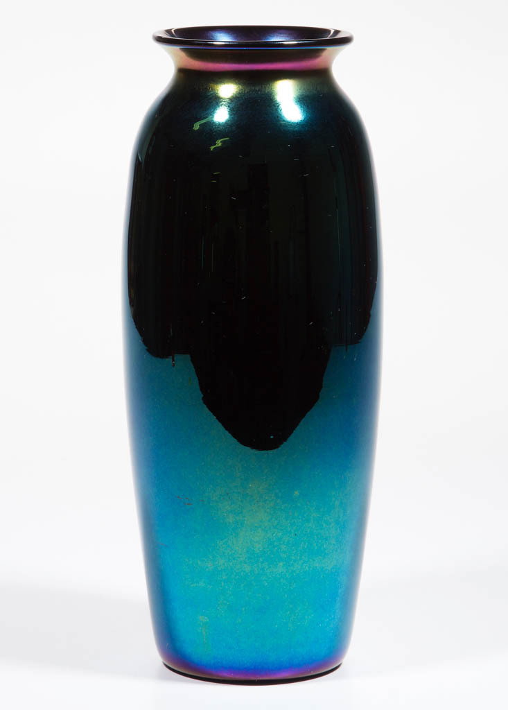IMPERIAL IRIDESCENT FREE HAND VASE: IMPERIAL IRIDESCENT FREE HAND VASE, blue iridescent with a glossy finish, Lead Lustre 418-10, polished pontil mark. Imperial Glass Co. Circa 1925. 11 1/4" H, 3 1/2" D rim, 3 1/4" D base. Virtually und