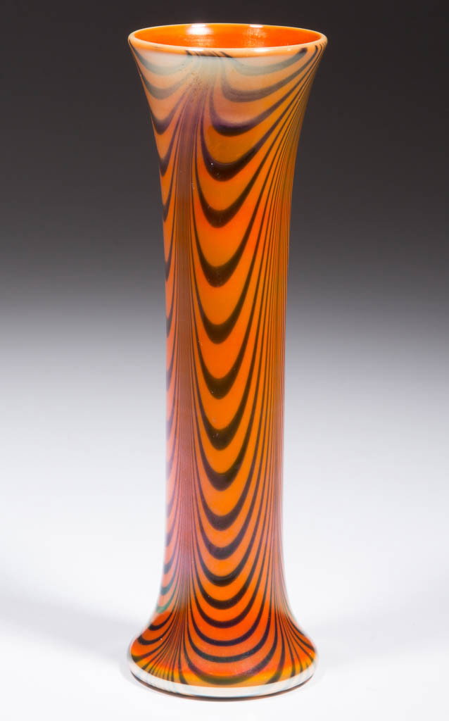 IMPERIAL DECORATED FREE HAND VASE: IMPERIAL DECORATED FREE HAND VASE, orange with four groups of blue loopings, Lead Lustre 412-22, polished pontil mark. Imperial Glass Co. Circa 1925. 8 3/4" H, 2 1/2" D rim, 2 1/2" D base. Undamaged. 