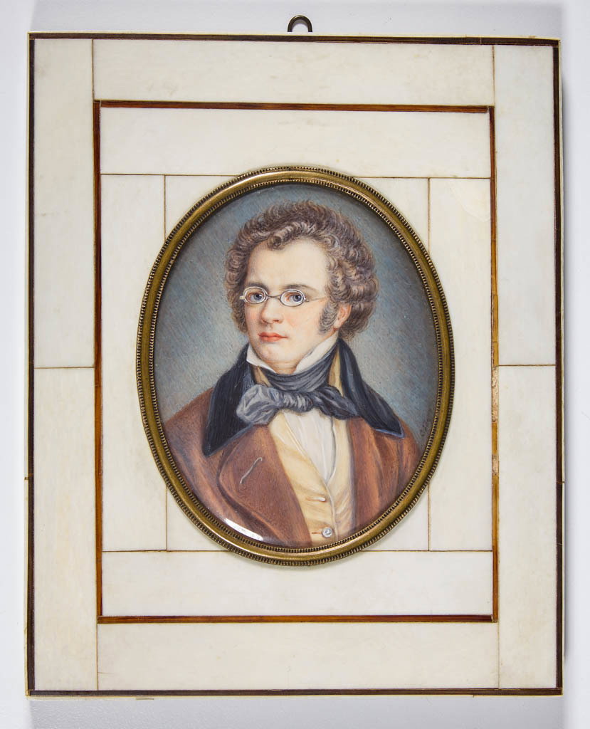 CARL JAGER (GERMAN, 1833-1887) MINIATURE PORTRAIT OF: CARL JAGER (GERMAN, 1833-1887) MINIATURE PORTRAIT OF FRANZ SCHUBERT, watercolor on ivory, sitter sporting spectacles, yellow vest, and russet coat, signed "C. Jager" right edge. Housed in a period, po