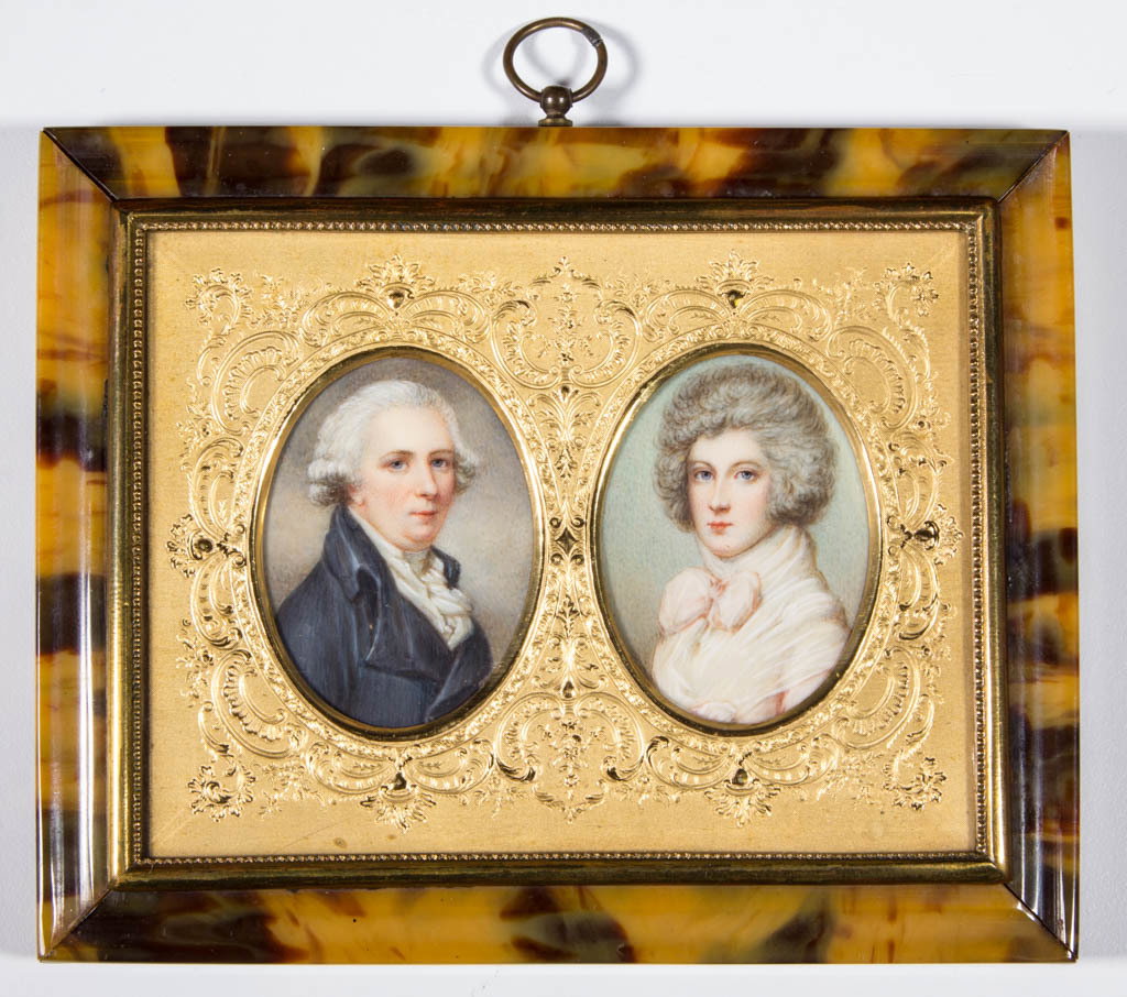 PAIR OF BRITISH OR CONTINENTAL SCHOOL (19TH CENTURY): PAIR OF BRITISH OR CONTINENTAL SCHOOL (19TH CENTURY) MINIATURE PORTRAITS, watercolor on ivory (each), likely a husband and wife, each in formal attire, no signature(s) located. Housed together under a