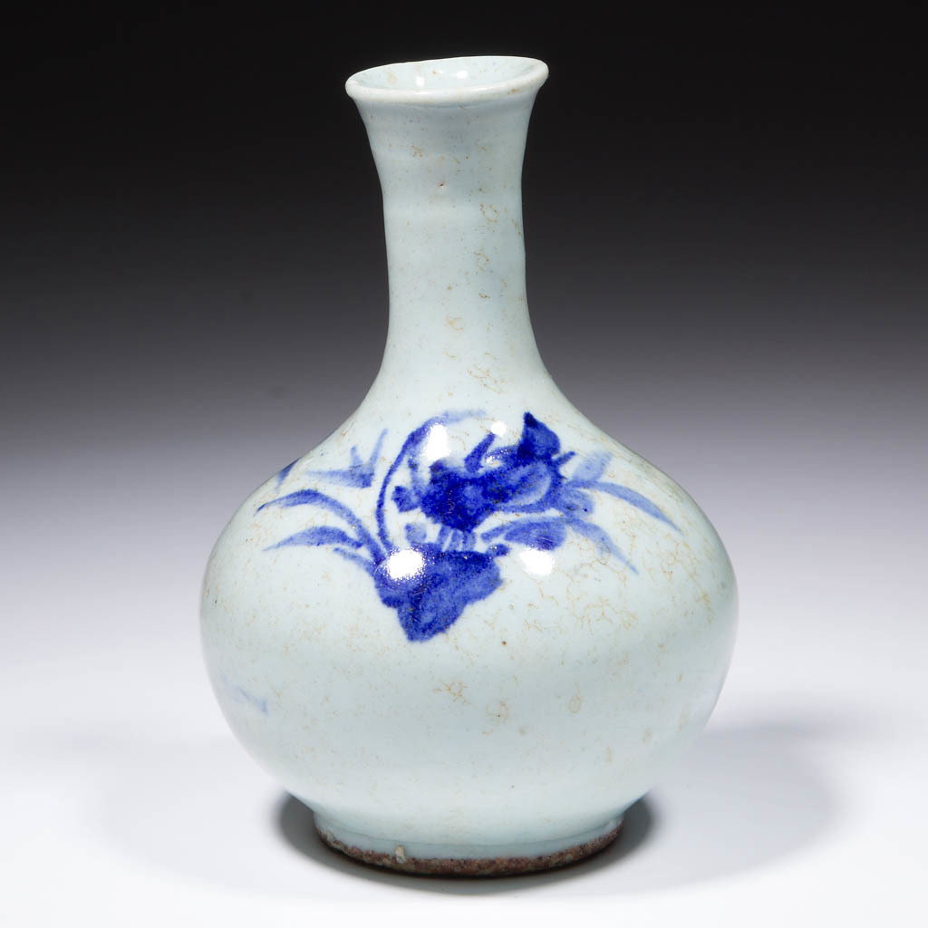 CHINESE EXPORT CELADON PORCELAIN VASE: CHINESE EXPORT CELADON PORCELAIN VASE, low form with bulbous base and tapered neck, having two blue floral decorations on one shoulder and light celadon glaze, sanded/rough surface on foot rim from ki