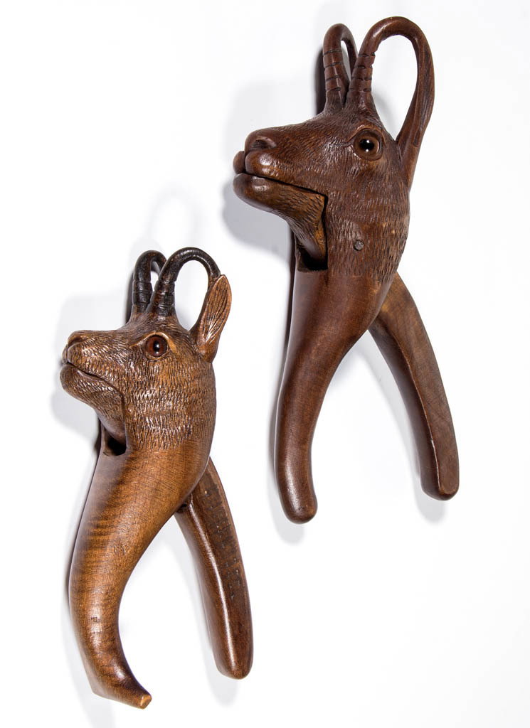 GERMAN BLACK FOREST CARVED FIGURAL NUTCRACKERS, LOT OF: GERMAN BLACK FOREST CARVED FIGURAL NUTCRACKERS, LOT OF TWO, comprising two finely executed ram figures with glass eyes, one marked indistinctly. Both retain fine old surfaces with warm color. Late 19t