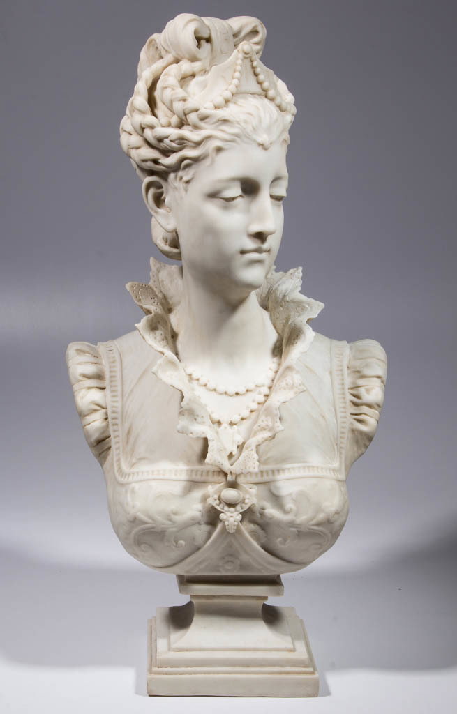 CONTEMPORARY RESIN BUST: CONTEMPORARY RESIN BUST, having smooth, marble-like finish of a woman with elaborate hairdo, jewelry, and ornate clothing, on raised pedestal. Marked "PARIAN PARIS" on back of base. 20th century. 25 1