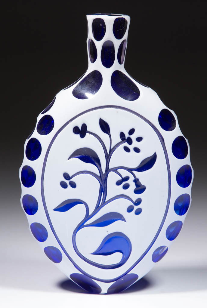 CUT OVERLAY FLORAL AND PUNTY FLASK: CUT OVERLAY FLORAL AND PUNTY FLASK, opaque white to cobalt blue, spout and sides filled with punty cuts, floral design to the front, plain reverse, factory-polished base. Maker unverified. 1860-1890. 