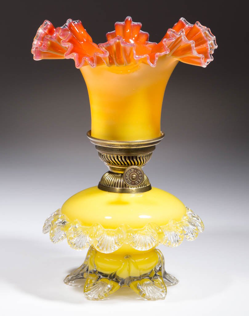 ART GLASS WITH RIGAREE MINIATURE LAMP: ART GLASS WITH RIGAREE MINIATURE LAMP, opaque lemon yellow compressed globular-form font, applied colorless rigaree band to medial of body with ribbed scallops, applied colorless base with five ribbed