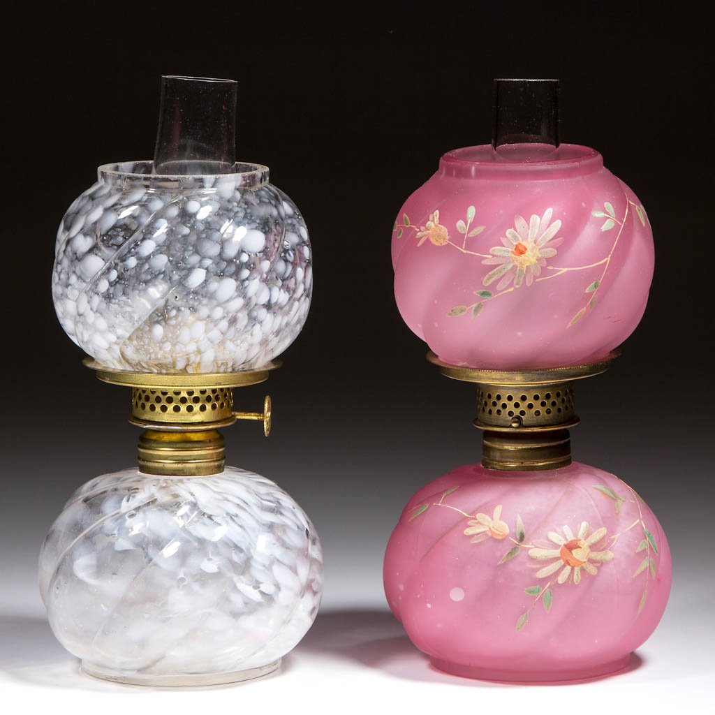 PARIAN SWIRL MINIATURE LAMPS, LOT OF TWO: PARIAN SWIRL MINIATURE LAMPS, LOT OF TWO, cased pink with satin finish and polychrome daisy decoration, comprising a cased pink with satin finish example, polychrome daisy decoration; and a colorless 