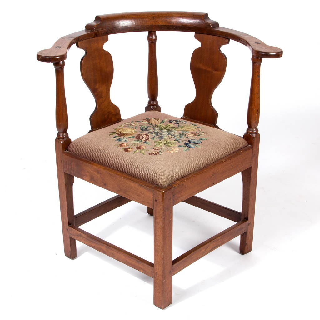 VIRGINIA WALNUT CORNER / SMOKING CHAIR: VIRGINIA WALNUT CORNER / SMOKING CHAIR, low molded crest rail, shaped arm rests, solid vasiform splats flanked by baluster-turned supports, square legs joined with box stretcher. Old refinished surfac