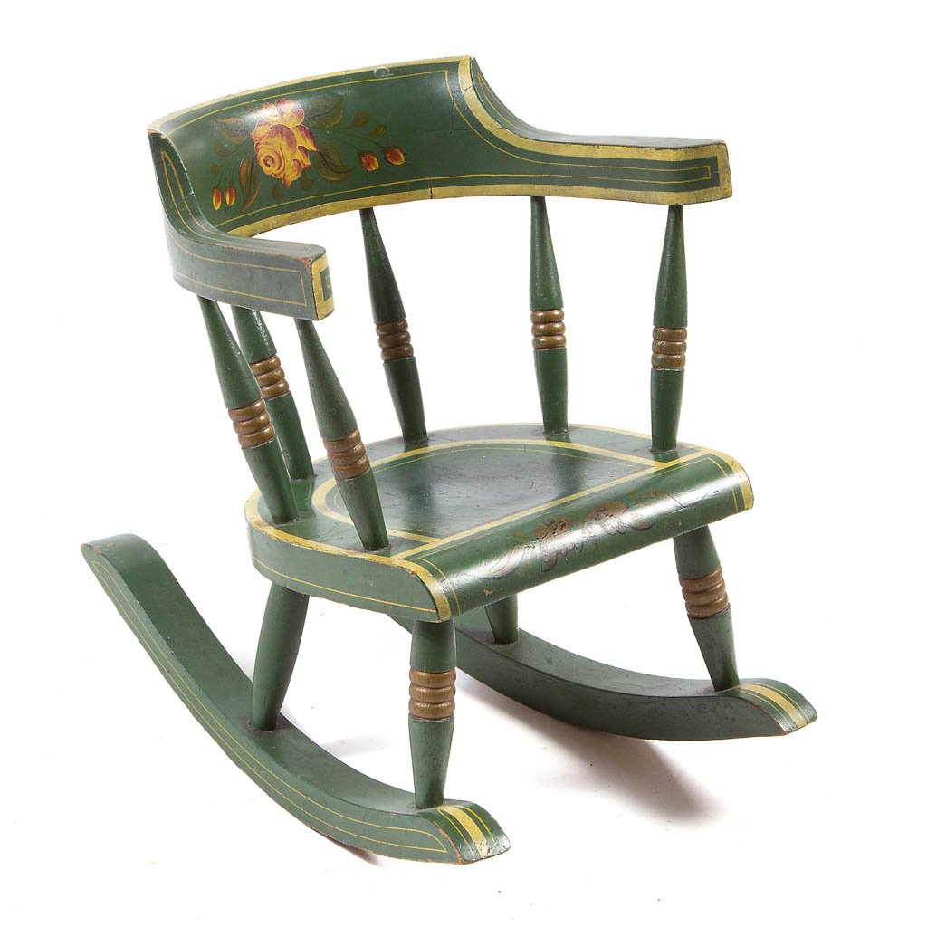PENNSYLVANIA PAINT-DECORATED CHILD'S ROCKING CHAIR: PENNSYLVANIA PAINT-DECORATED CHILD'S ROCKING CHAIR, U-shape crest rail and arms above six turned spindles and plank seat with rounded front edge, raised on four legs and thick rockers. Original green 