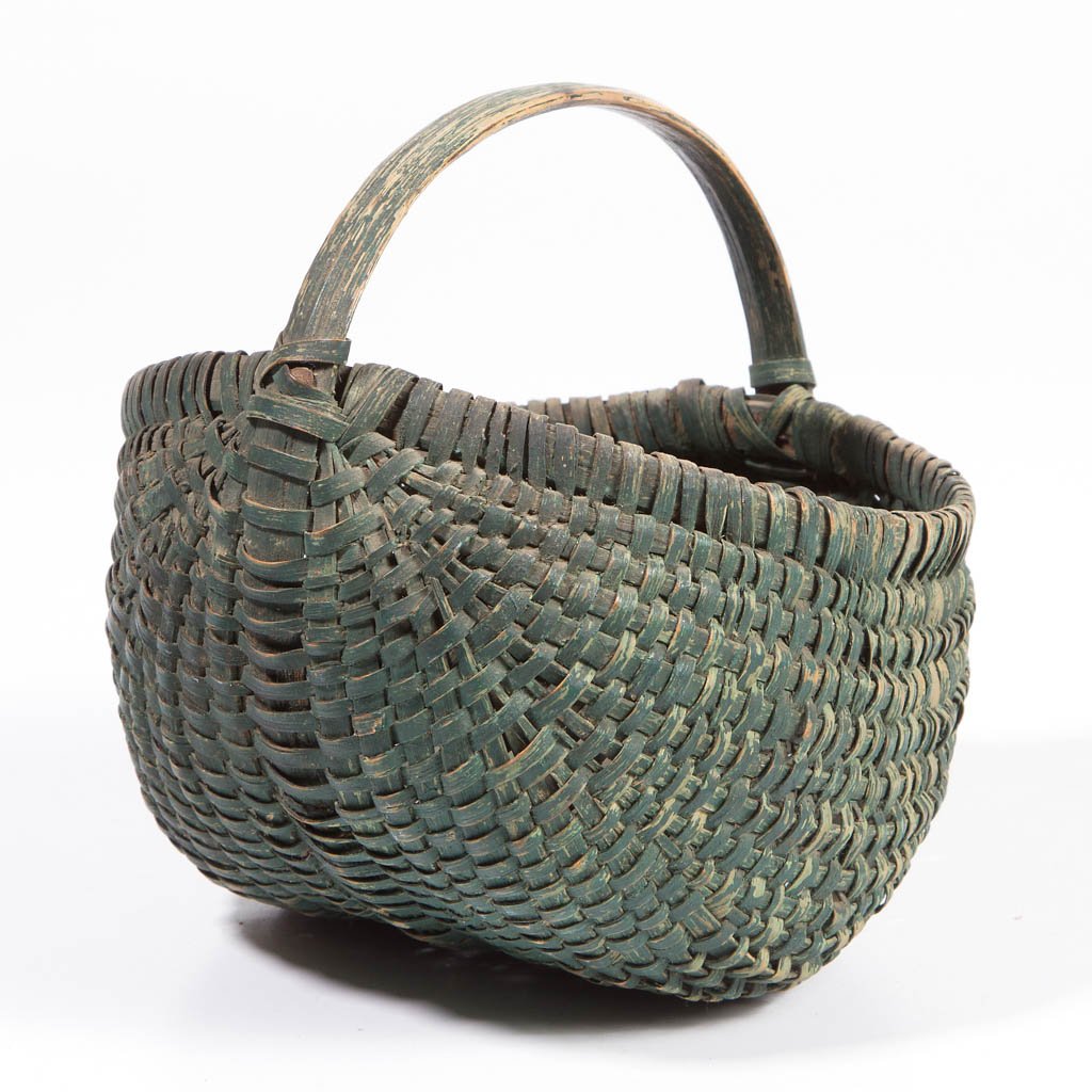 SHENANDOAH VALLEY OF VIRGINIA PAINTED RIB-TYPE: SHENANDOAH VALLEY OF VIRGINIA PAINTED RIB-TYPE WOVEN-SPLINT BASKET, white oak, diminutive melon-form with wrapped rim, arched handle, and simple X-shape handle supports. Original dry dark green-painte