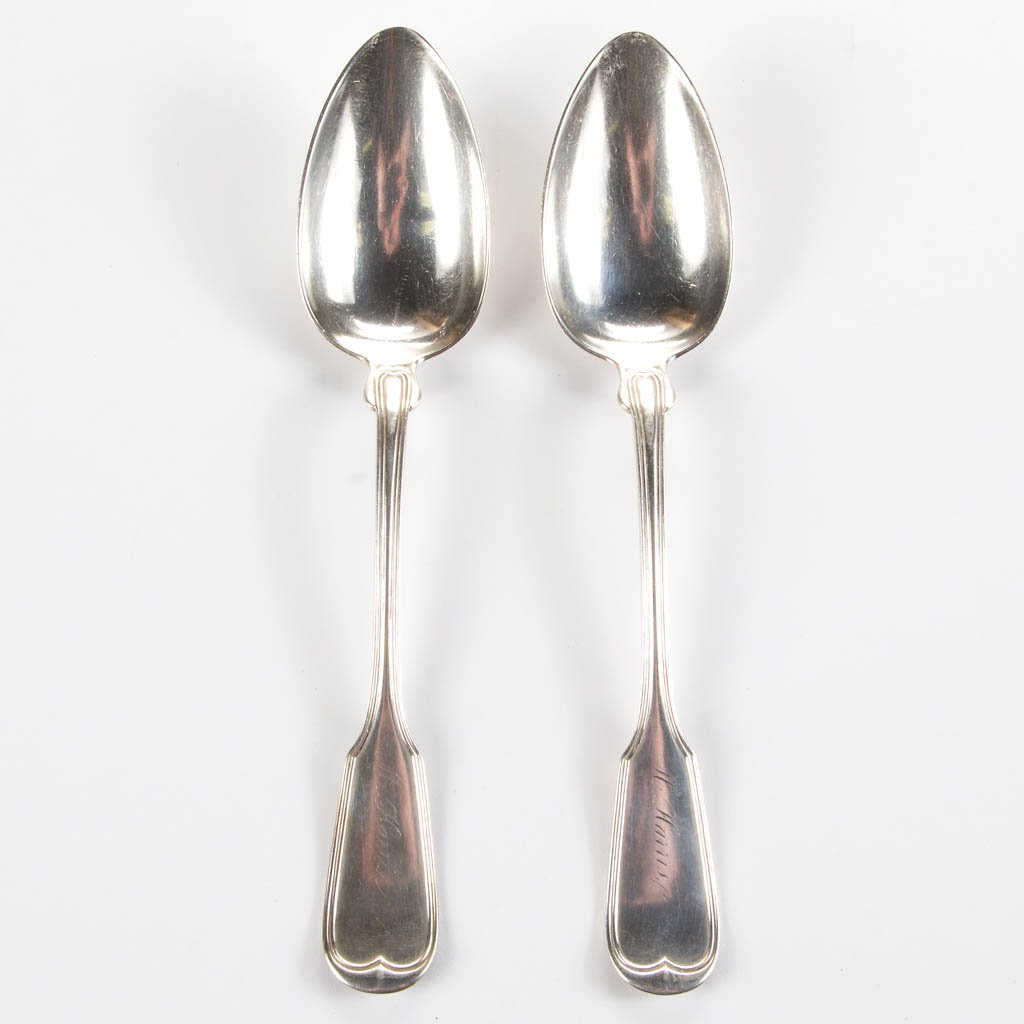 MEMPHIS, TENNESSEE COIN SILVER SPOONS, SET OF TWO: MEMPHIS, TENNESSEE COIN SILVER SPOONS, SET OF TWO, forward-tipped fiddle back table or serving spoons, with double rib to handle border, monogram to handle, marked "COIN" and "F. H. CLARK & CO." for F