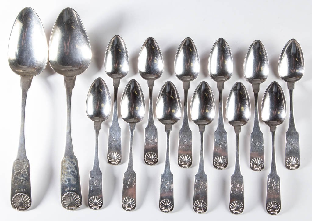 AMERICAN COIN SILVER SPOONS, LOT OF FOURTEEN: AMERICAN COIN SILVER SPOONS, LOT OF FOURTEEN, comprising twelve backward-tipped fiddle back teaspoons and two backward-tipped fiddle back serving or table spoons, each with embossed shell to handle ti
