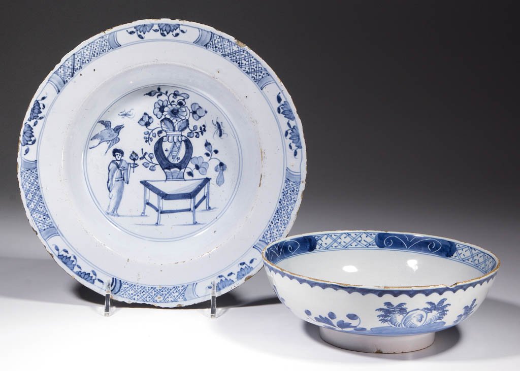 ENGLISH DELFT TIN-GLAZED CHINOISERIE EARTHENWARE BOWL: ENGLISH DELFT TIN-GLAZED CHINOISERIE EARTHENWARE BOWL AND DISH, LOT OF TWO, comprising one shallow bowl measuring 8" D and 2 7/8" H, with raised foot rim, blue floral and tree designs on sides, and ch