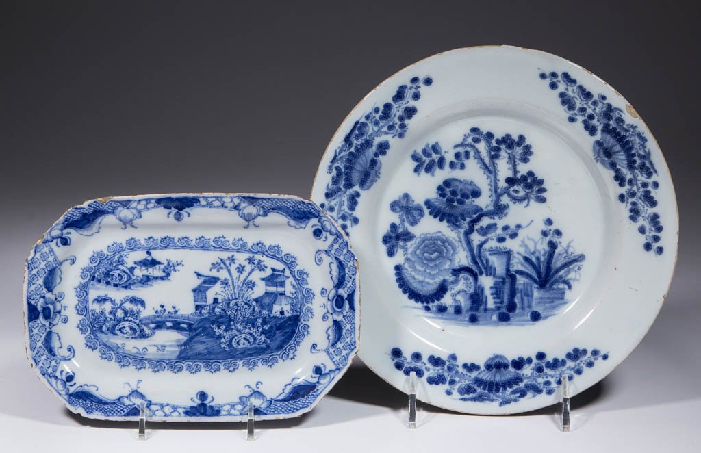 IRISH / SCOTTISH DELFT TIN-GLAZED CHINOISERIE: IRISH / SCOTTISH DELFT TIN-GLAZED CHINOISERIE EARTHENWARE PLATE AND TRAY, LOT OF TWO, comprising one circular plate likely made in Scotland having floral sprays on rim and interior with floral and fol