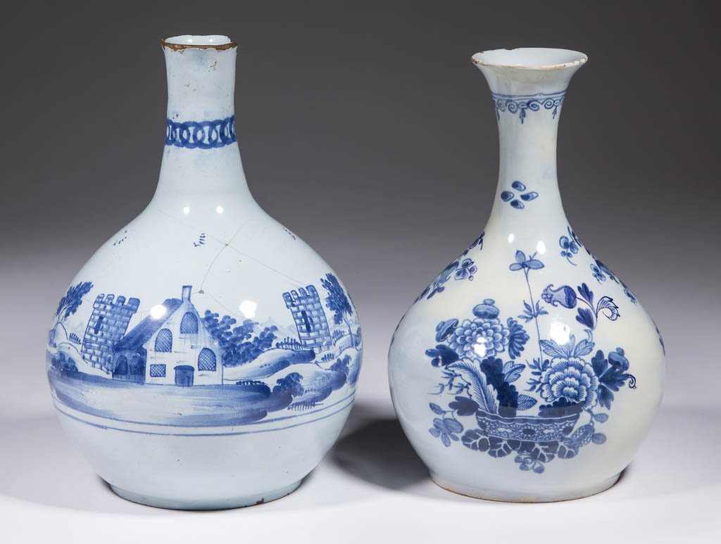 ENGLISH DELFT TIN-GLAZED EARTHENWARE WATER BOTTLE /: ENGLISH DELFT TIN-GLAZED EARTHENWARE WATER BOTTLE / EWER / GUGLET, LOT OF TWO, one having a tall, narrow neck with bulbous base, house and castle turret designs on sides, and one with flared, narrow n