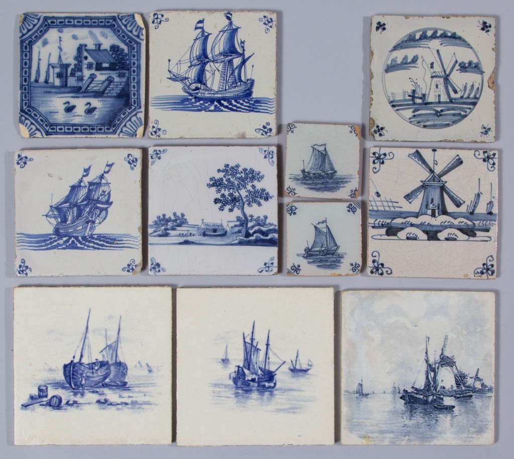 DUTCH DELFT TIN-GLAZED EARTHENWARE TILES, LOT OF 11: DUTCH DELFT TIN-GLAZED EARTHENWARE TILES, LOT OF 11, in blue with designs of ships, windmills, and architecture. 19th century and later. Two 2 7/8" x 2 7/8", three 6" x 6", the remainder approximately