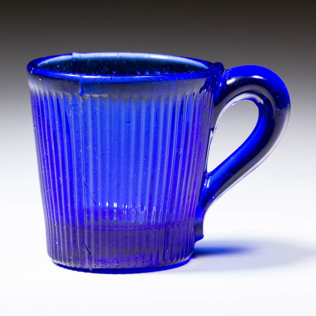 FINE RIB / REEDED (OMN) TOY LEMONADE: FINE RIB / REEDED (OMN) TOY LEMONADE, cobalt blue. Boston & Sandwich Glass Co., New England Glass Co., and possibly others. Third quarter 19th century. 1 3/4" H, 1 3/4" D rim. Undamaged. Literature: P