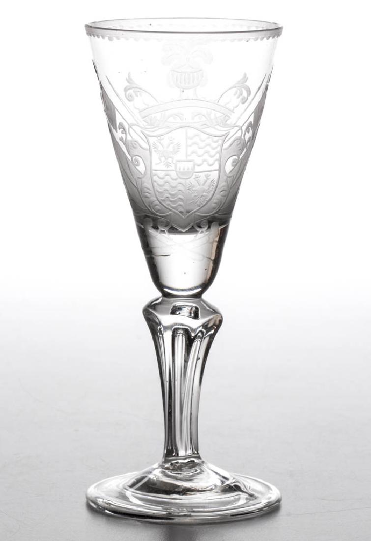 CONTINENTAL FREE-BLOWN AND ARMORIAL ENGRAVED: CONTINENTAL FREE-BLOWN AND ARMORIAL ENGRAVED MOLDED-PEDESTAL WINE GLASS, colorless non-lead glass, pointed round funnel bowl with solid base decorated with a crest featuring two Russian double-head ea