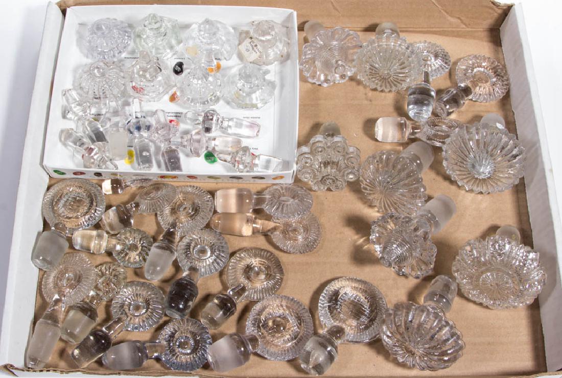 ASSORTED PRESSED GLASS STOPPERS AND COVERS, LOT OF 42 (1 of 1)