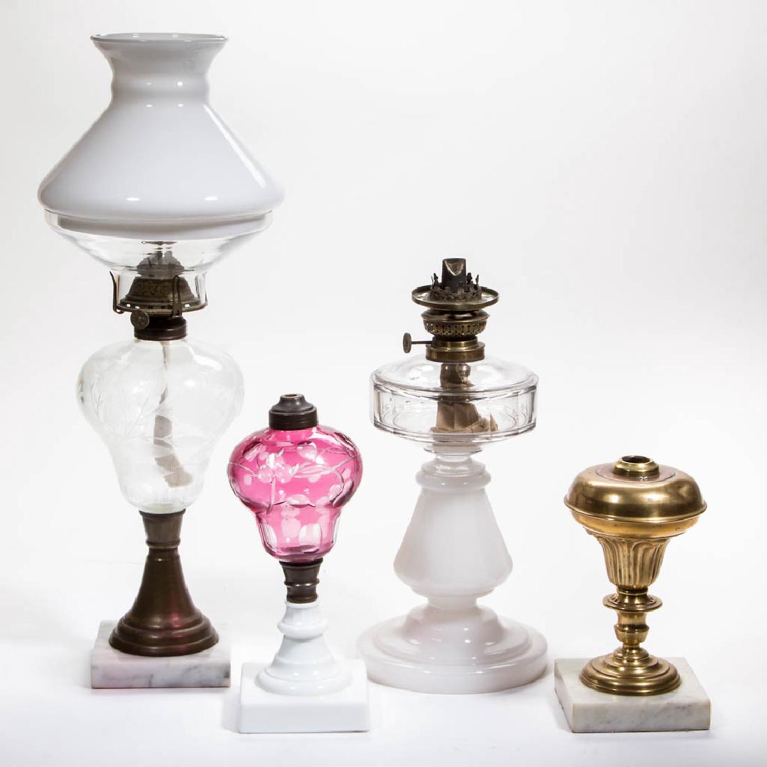 ASSORTED PATTERN KEROSENE STAND LAMPS, LOT OF FOUR (1 of 1)