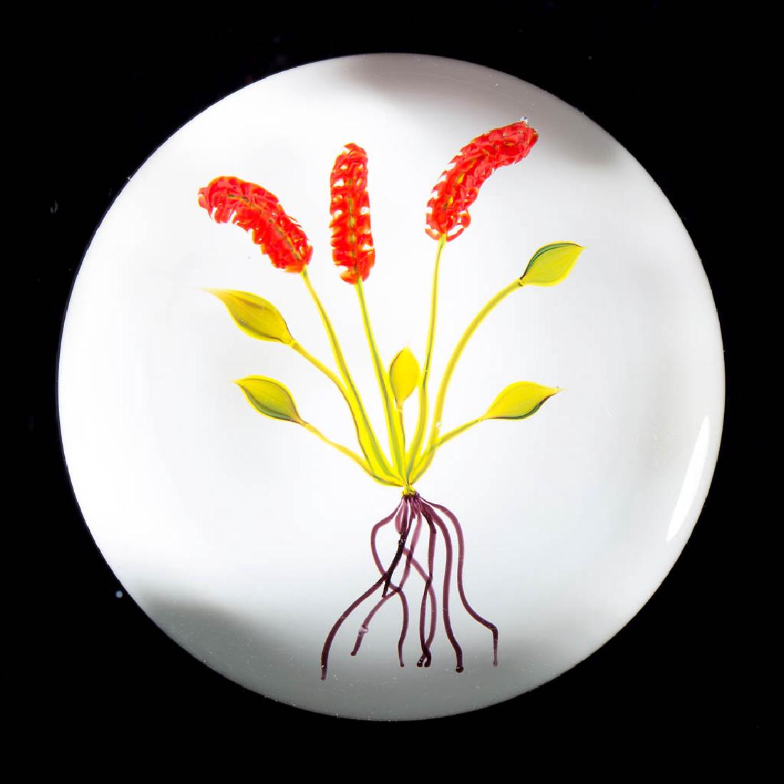 PAUL STANKARD STUDIO ART GLASS LAMPWORK MINIATURE: PAUL STANKARD STUDIO ART GLASS LAMPWORK MINIATURE PAPERWEIGHT, "Botanical" series, depicting a flowering plant with three compound red blossoms on green stems, with additional stems terminating in sin